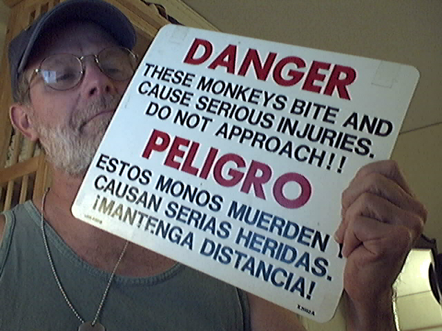 Jim with Monkey Sign